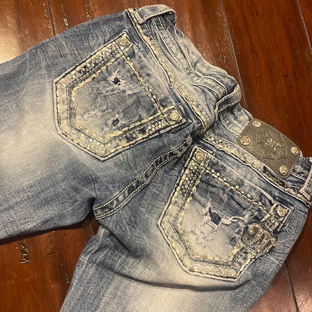 Miss Me size 27 boot cut jeans.